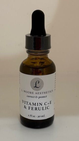 Bottle of vitamin C+E & Ferulic serum with dropper on a white background. L Moore Aesthetics Vitamin C&E Ferulic